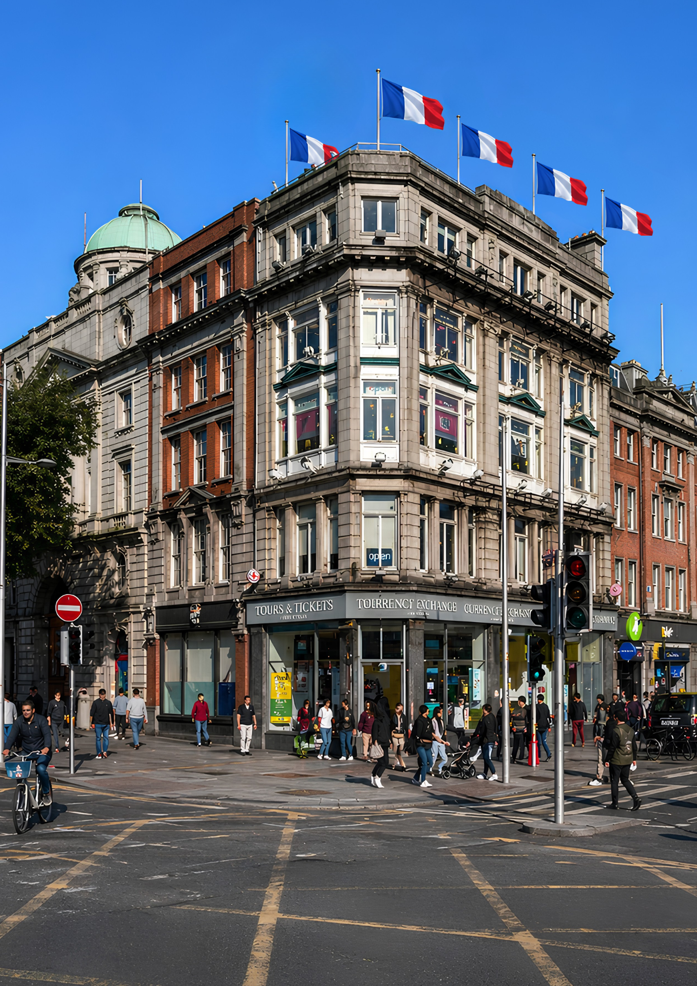 French flags flying on the tcube building on O'Connell Bridge, Dublin, during Bastille Day celebrations